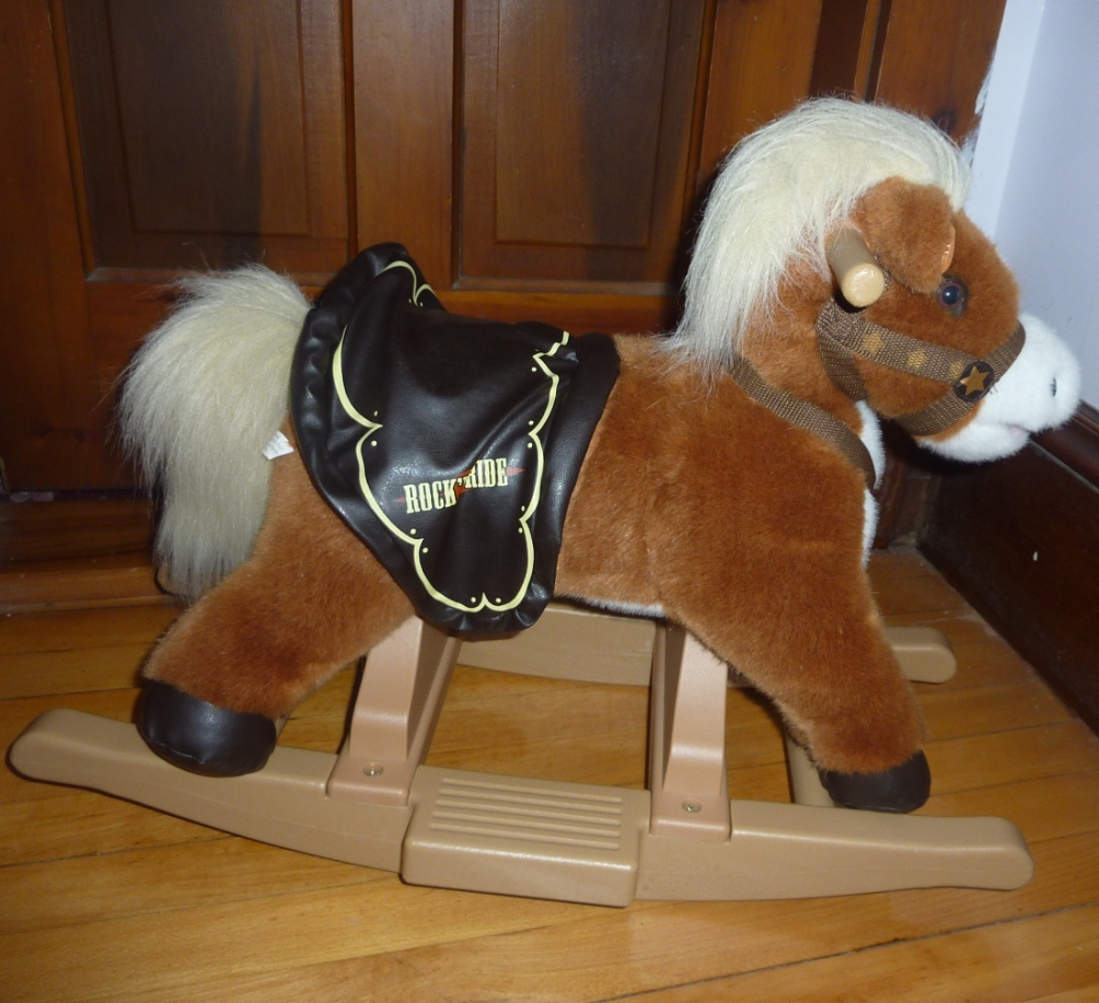 demon doll rocking horse